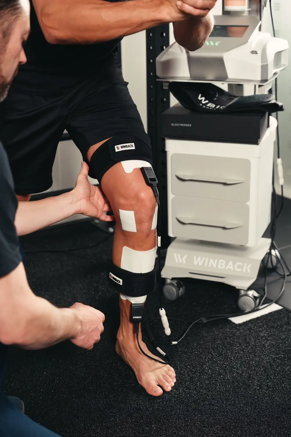 Adhesive electrodes above and below a knee